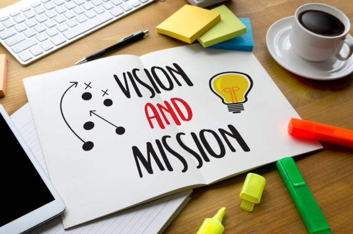 cahier avec marqué vision and mission
